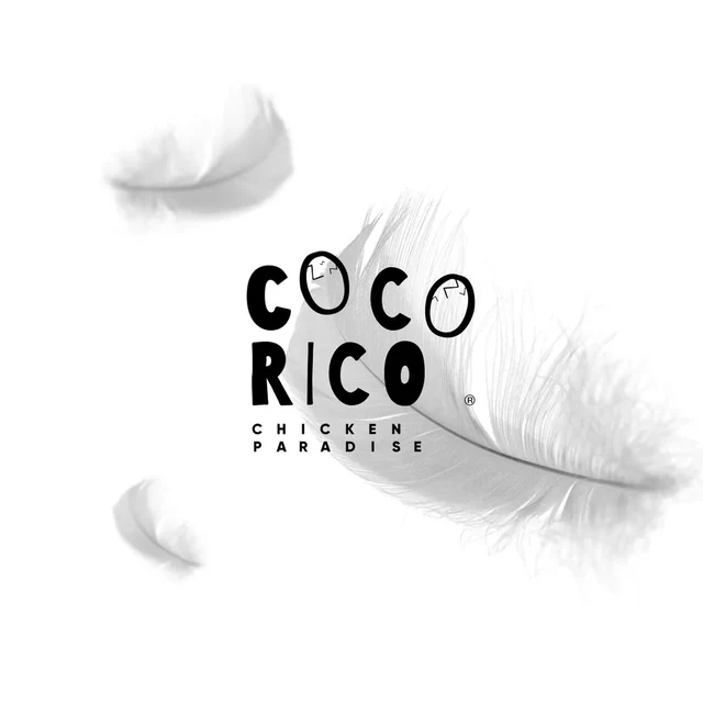 Чёрная надпись Cocorico и белые перья — ИЗДИДЖИТЛ
